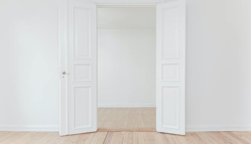 Open white double door to a new job